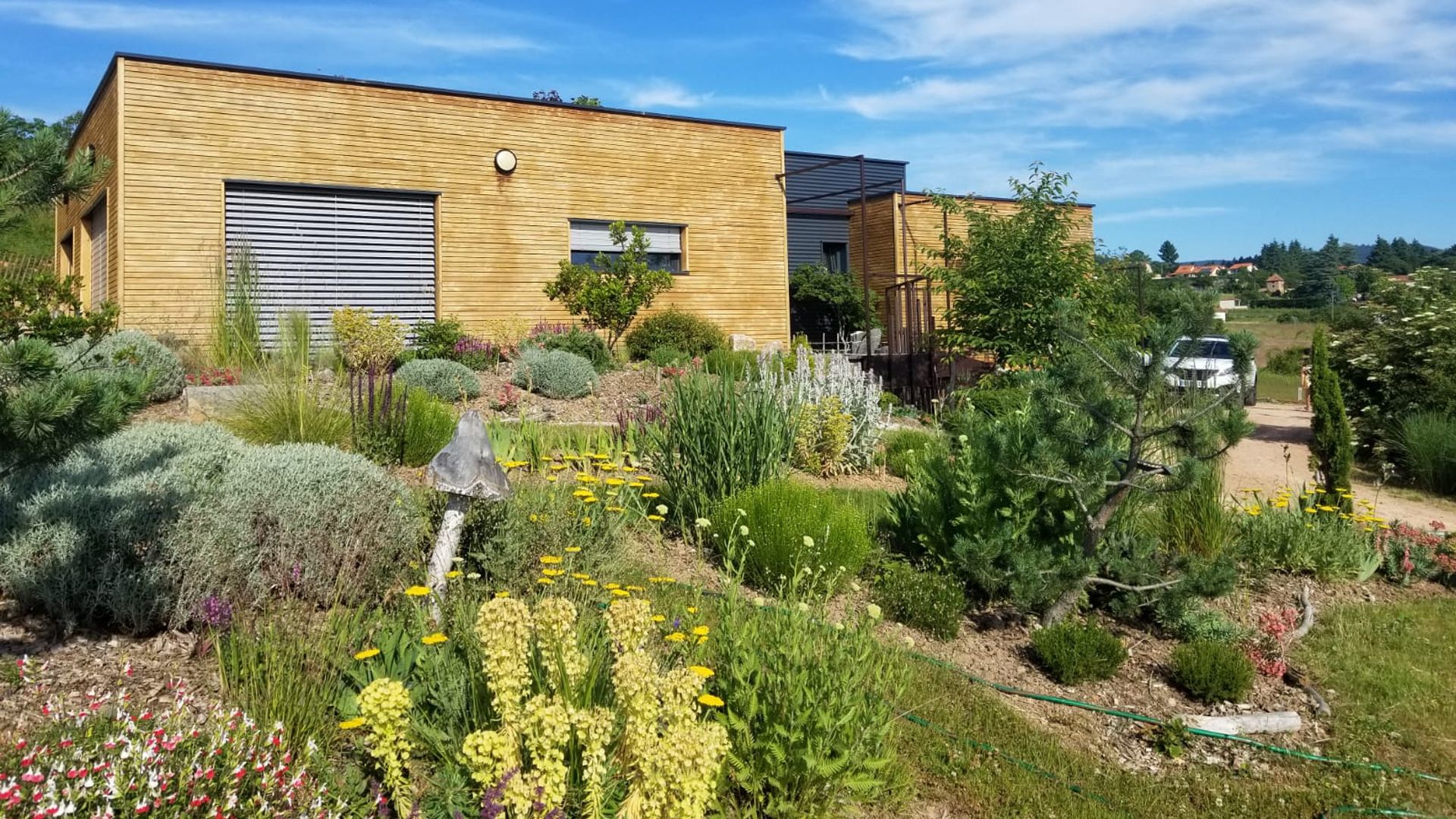 Maison habitée et maison en chantier bois sur la côte Roannaise - Lignatech